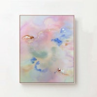 an abstract painting on a white wall