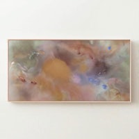 an abstract painting hanging on a wall