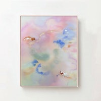 an abstract painting on a white wall